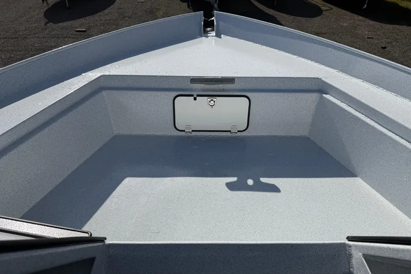 Slide: The Image of 2026 KingFisher 2425 Escape HT boat interior, featuring spacious storage compartment. - 29