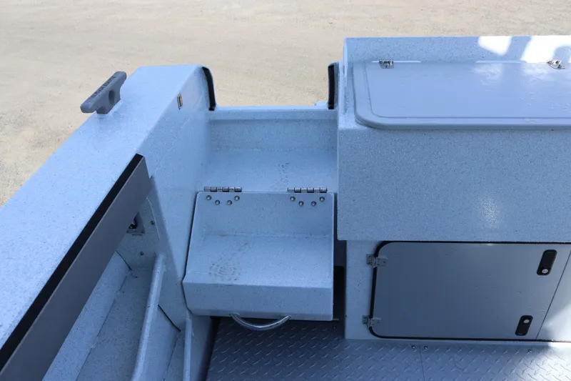 Slide: The Image of Interior view of 2026 KingFisher 2425 Escape HT boat, featuring storage compartments and seating. - 33