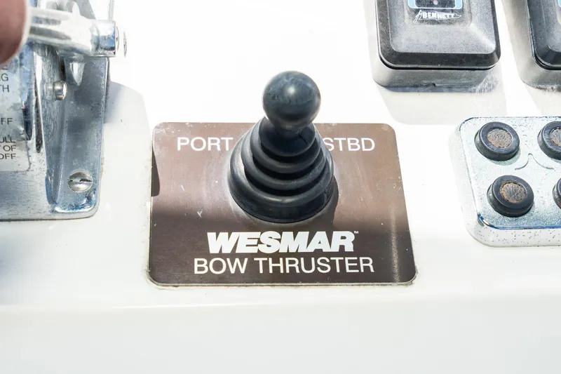 Slide: The Image of Control panel of a 1987 Grand Banks 46 Classic with Wesmar bow thruster joystick. - 18