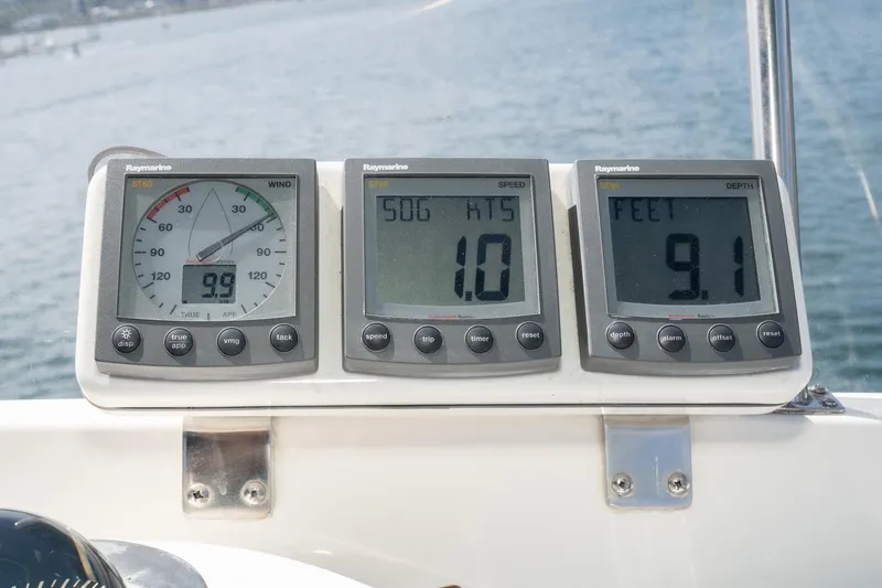 Slide: The Image of Raymarine instruments on 1987 Grand Banks 46 Classic, displaying wind, speed, and depth readings. - 19