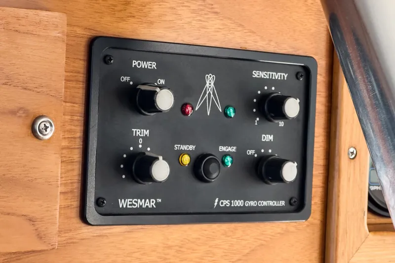 Slide: The Image of Control panel of a 1987 Grand Banks 46 Classic boat with Wesmar CPS 1000 Gyro Controller. - 35