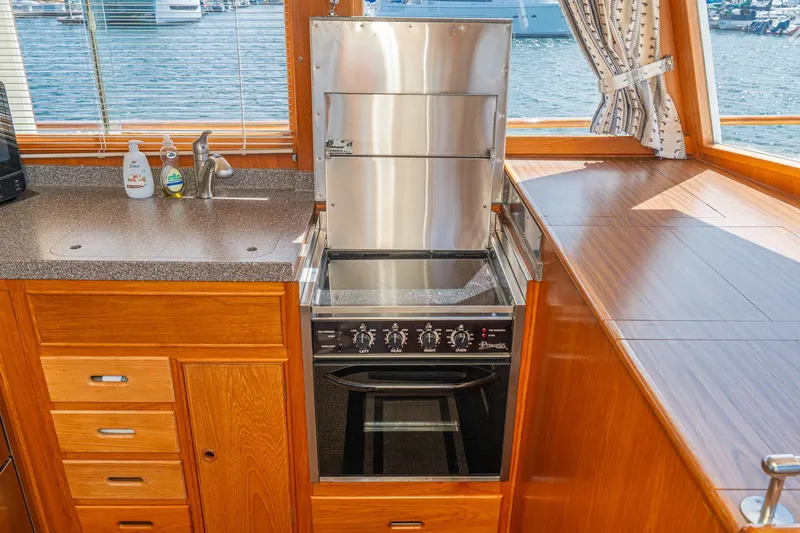 Slide: The Image of Galley kitchen in 1987 Grand Banks 46 Classic yacht with stove and sink. - 42