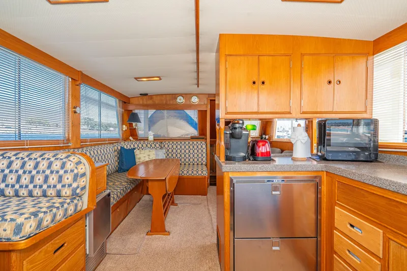 Slide: The Image of Interior of 1987 Grand Banks 46 Classic yacht with cozy seating and modern kitchen amenities. - 45