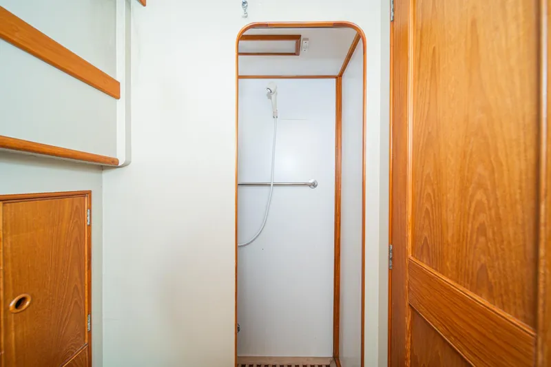 Slide: The Image of Shower area in 1987 Grand Banks 46 Classic yacht with wooden accents. - 75
