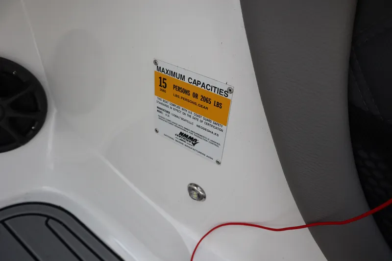 Slide: The Image of Capacity label on 2012 Cobalt A25 boat, indicating 15 persons or 2065 lbs. - 11
