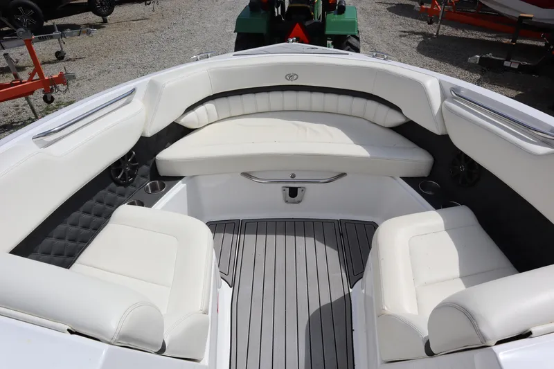 Slide: The Image of Luxurious 2012 Cobalt A25 boat interior with white seating and sleek design. - 2
