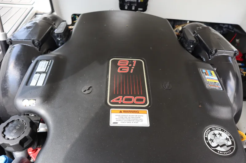 Slide: The Image of Engine of 2012 Cobalt A25 boat, featuring 8.1 Gi 400 horsepower specifications. - 26