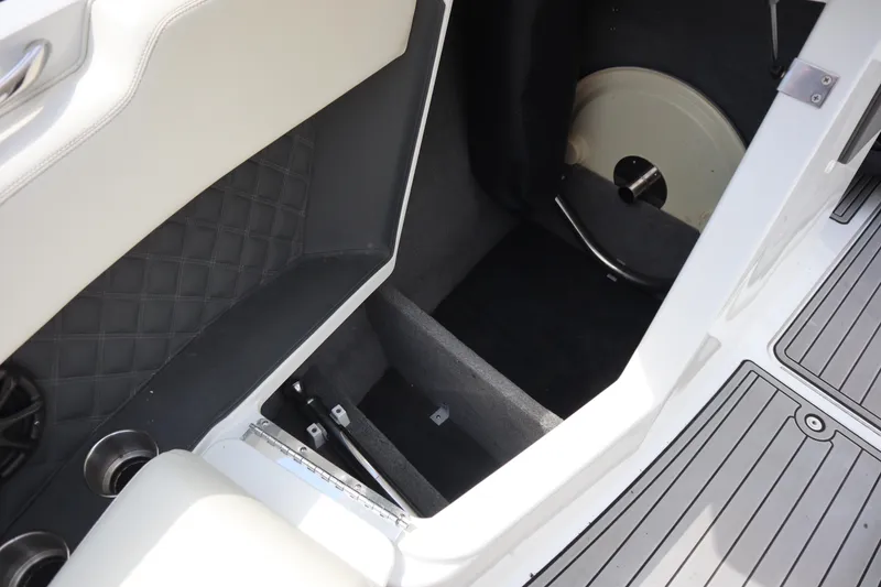 Slide: The Image of Interior storage compartment of a 2012 Cobalt A25 boat. - 5