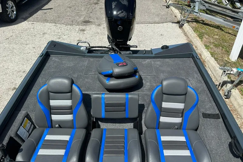 Slide: The Image of 2026 Ranger RT178 boat interior with gray and blue seating, showcasing modern design. - 12