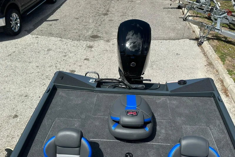 Slide: The Image of 2026 Ranger RT178 boat with sleek design and modern outboard motor. - 14