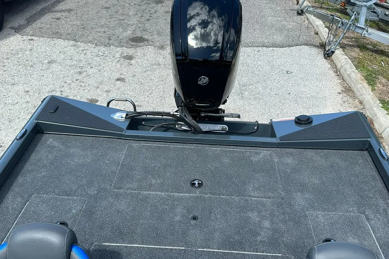 Slide: The Image of 2026 Ranger RT178 boat with motor, viewed from the rear on a trailer. - 15