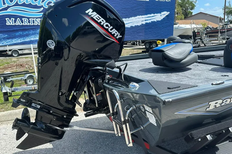 Slide: The Image of 2026 Ranger RT178 boat with Mercury outboard motor displayed at a marina. - 19