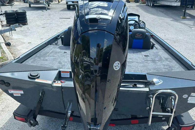 Slide: The Image of 2026 Ranger RT178 boat with powerful outboard motor, parked on a trailer. - 22