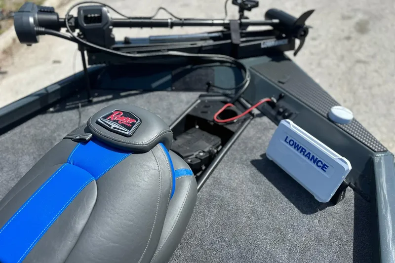 Slide: The Image of 2026 Ranger RT178 boat interior with Lowrance electronics and blue-accented seat. - 4