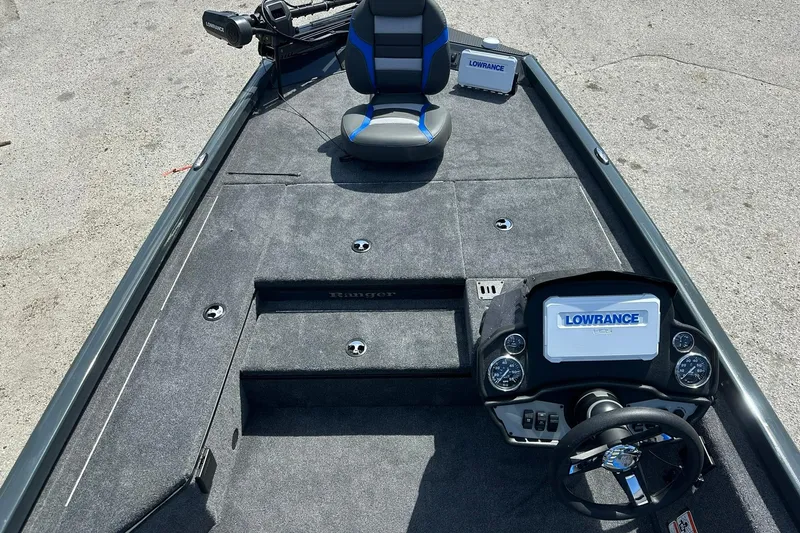 Slide: The Image of 2026 Ranger RT178 boat interior with Lowrance electronics and seating. - 6