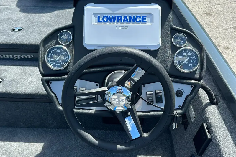Slide: The Image of 2026 Ranger RT178 boat dashboard with steering wheel and Lowrance HDS display. - 8