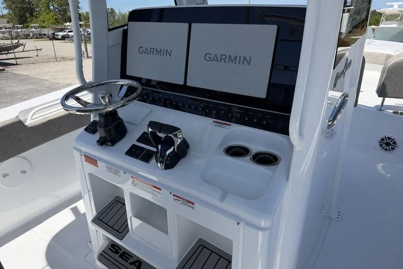 Slide: The Image of 2026 Sea Hunt Gamefish 30 boat with dual engines and spacious seating. - 11