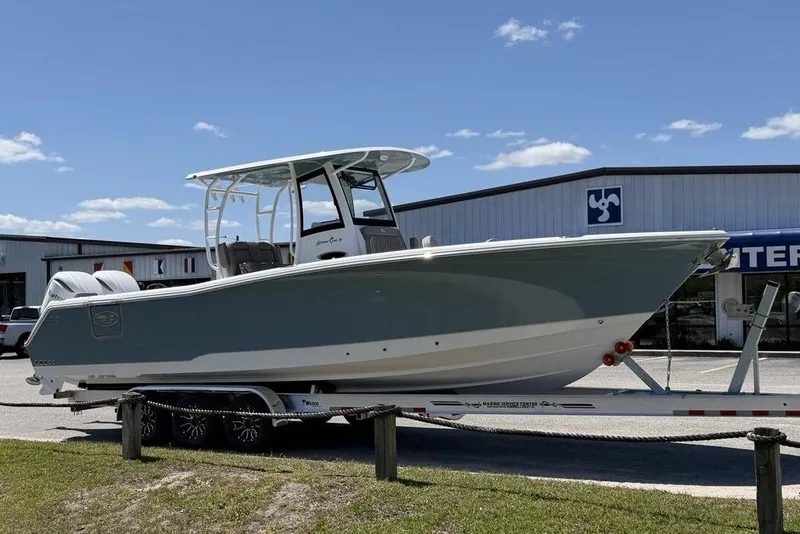 Slide: The Image of 2026 Sea Hunt Gamefish 30 boat with forward seating and dual engines. - 18