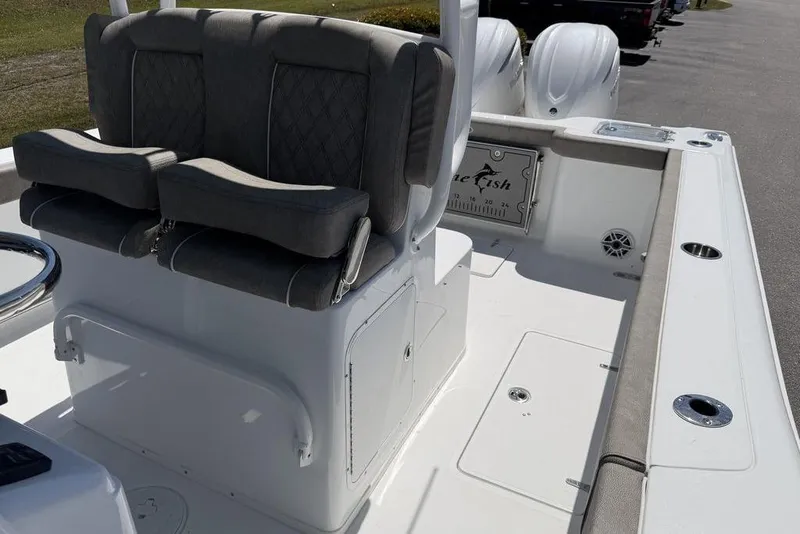 Slide: The Image of 2026 Sea Hunt Gamefish 30 boat with forward seating and dual engines. - 21