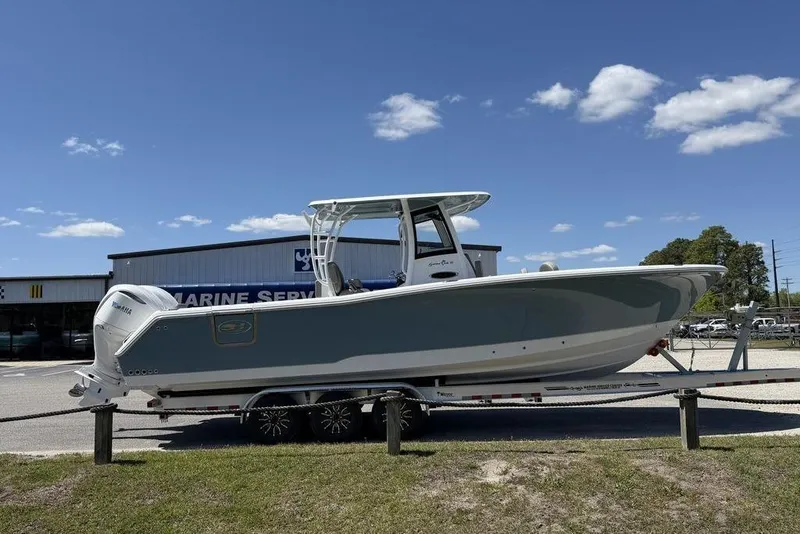Slide: The Image of 2026 Sea Hunt Gamefish 30 Forward Seating boat with spacious deck and seating area. - 22