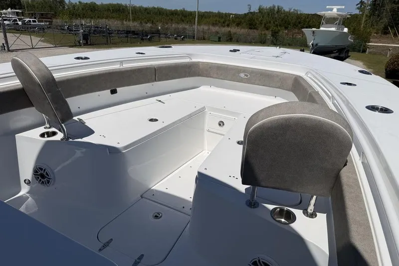 Slide: The Image of 2026 Sea Hunt Gamefish 30 Forward Seating boat with dual Yamaha engines on a trailer. - 8