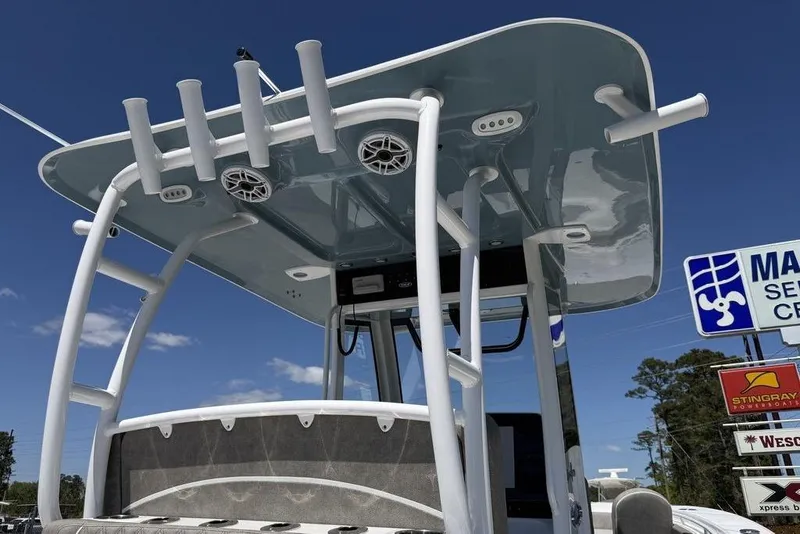 Slide: The Image of 2026 Sea Hunt Gamefish 30 boat interior with forward seating and storage compartment. - 9