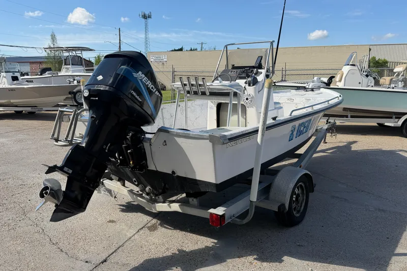 Slide: The Image of 2004 Kenner 1800 VISION boat on trailer with Mercury outboard motor. - 6
