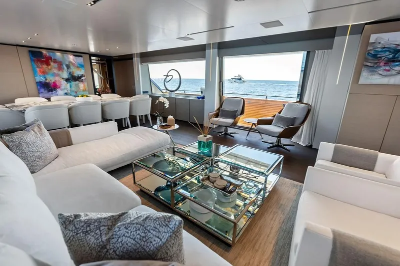 Slide: The Image of Luxurious interior of 2022 Custom Line Navetta 33 yacht with elegant seating and ocean view. - 63