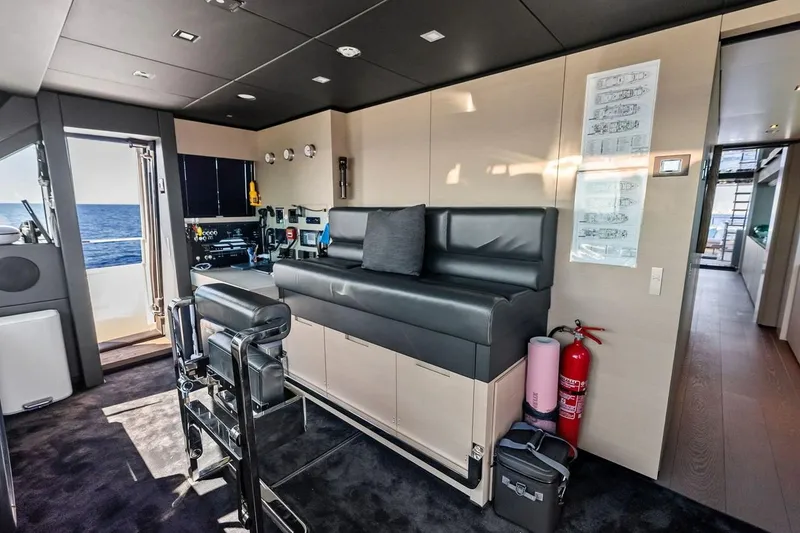 Slide: The Image of Luxurious interior of 2022 Custom Line Navetta 33 yacht with modern seating and ocean view. - 53