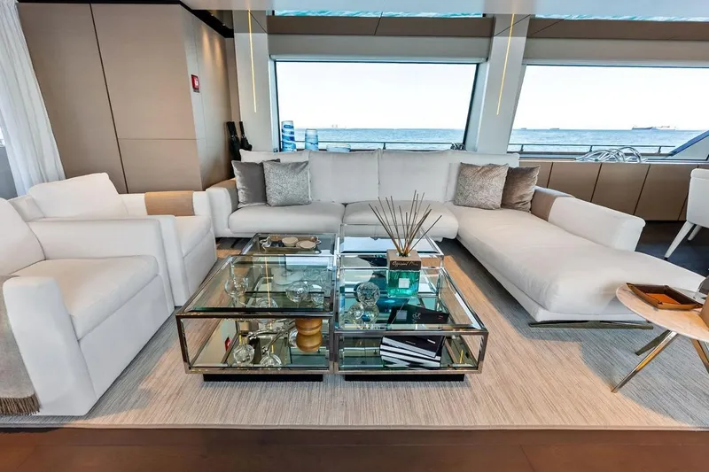 Slide: The Image of Luxurious interior of 2022 Custom Line Navetta 33 yacht with elegant seating and ocean view. - 62