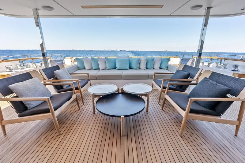 Slide: The Image of Luxurious deck seating on 2022 Custom Line Navetta 33 yacht with ocean view. - 57