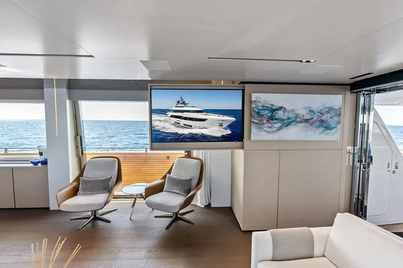 Slide: The Image of Luxurious interior of 2022 Custom Line Navetta 33 yacht with modern seating and ocean view. - 43