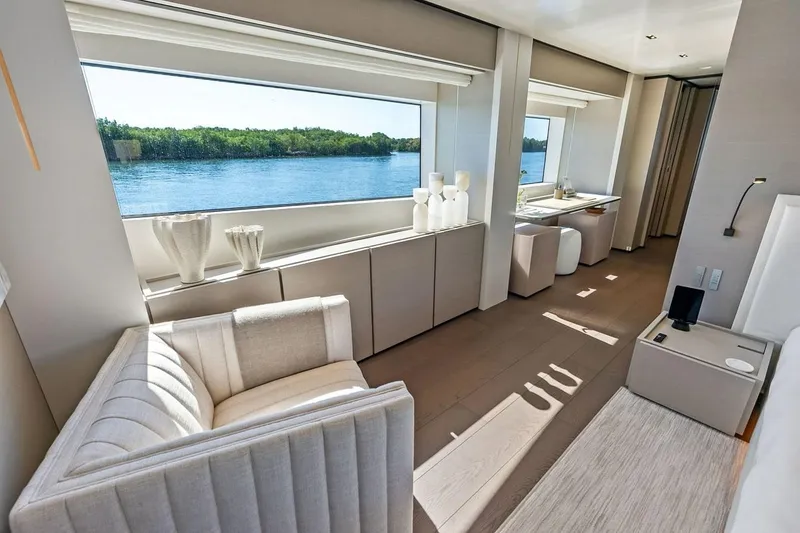 Slide: The Image of Luxurious interior of 2022 Custom Line Navetta 33 yacht with elegant furnishings and scenic water view. - 72