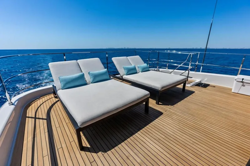 Slide: The Image of Luxury sun loungers on Custom Line Navetta 33 yacht deck, 2022 model, with ocean view. - 19