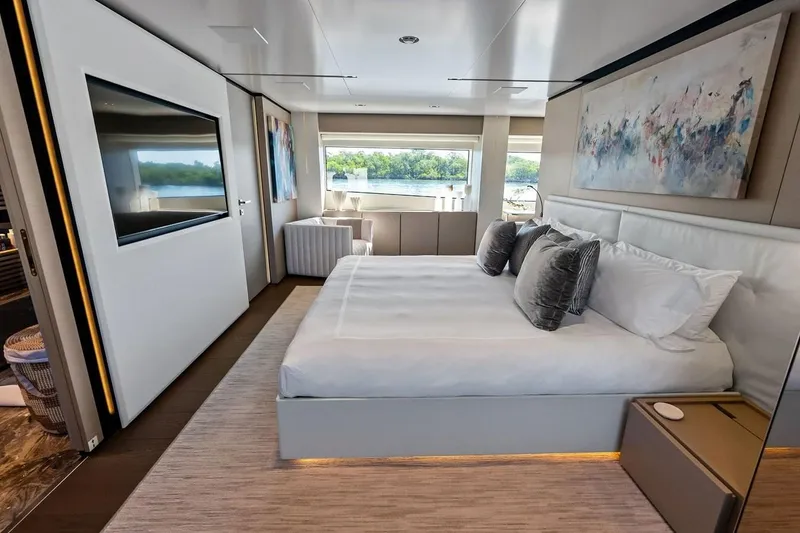 Slide: The Image of Luxurious bedroom in 2022 Custom Line Navetta 33 yacht, featuring modern decor and large windows. - 75