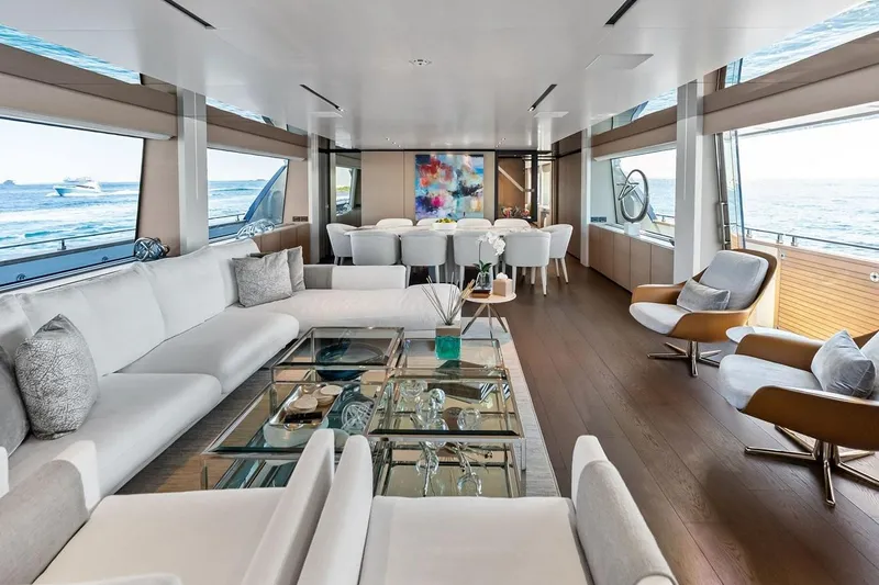 Slide: The Image of Luxurious interior of 2022 Custom Line Navetta 33 yacht with elegant seating and ocean views. - 64