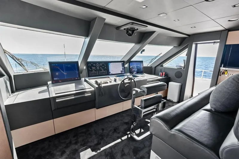 Slide: The Image of Luxurious helm of 2022 Custom Line Navetta 33 yacht with advanced navigation systems. - 50