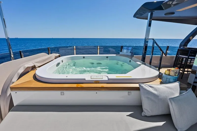 Slide: The Image of Luxurious jacuzzi on 2022 Custom Line Navetta 33 yacht with ocean view. - 17
