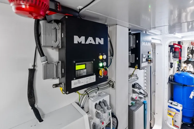 Slide: The Image of Engine room of 2022 Custom Line Navetta 33 yacht with MAN control panels. - 103