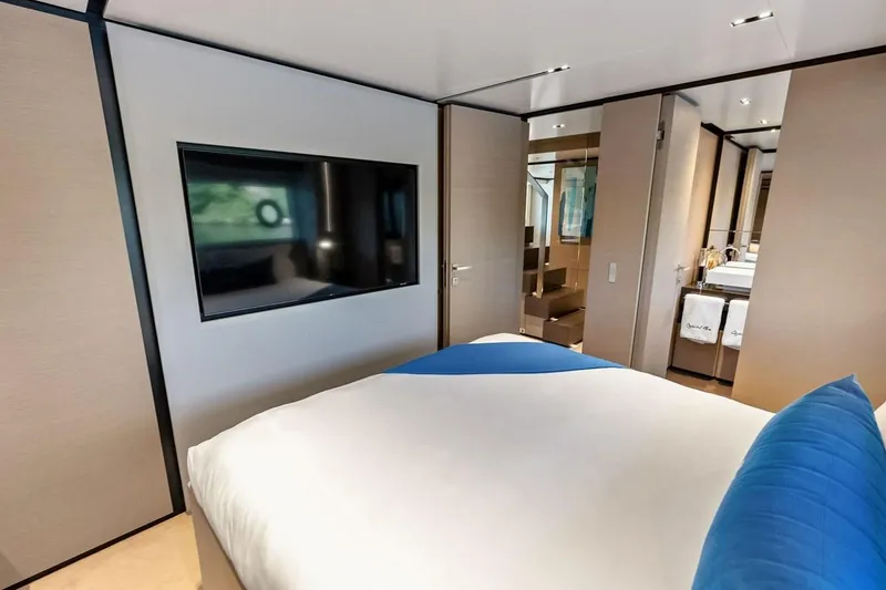 Slide: The Image of Luxurious bedroom interior of 2022 Custom Line Navetta 33 yacht with modern decor. - 87
