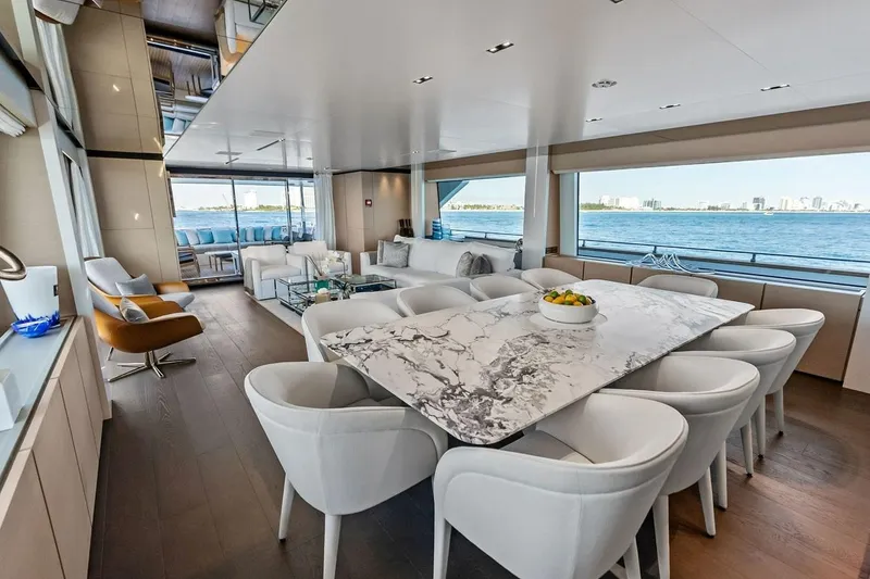 Slide: The Image of Luxurious interior of 2022 Custom Line Navetta 33 yacht with elegant dining area and ocean view. - 60