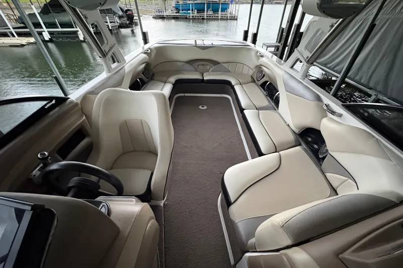 Slide: The Image of 2011 Malibu Wakesetter 247 LSV interior with spacious seating and modern design. - 13