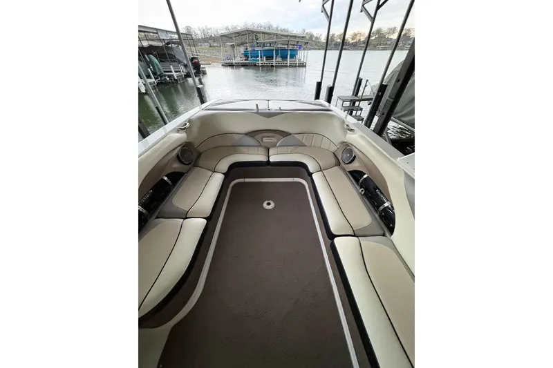 Slide: The Image of 2011 Malibu Wakesetter 247 LSV interior with spacious seating and lake view. - 16