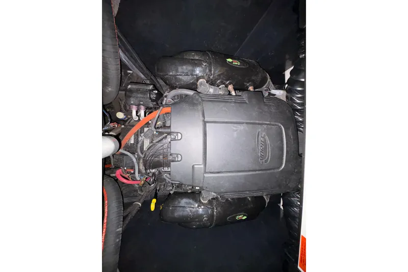 Slide: The Image of Engine of 2011 Malibu Wakesetter 247 LSV boat, showcasing intricate components. - 22