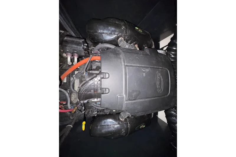 Slide: The Image of Engine of 2011 Malibu Wakesetter 247 LSV boat, showcasing intricate components. - 23