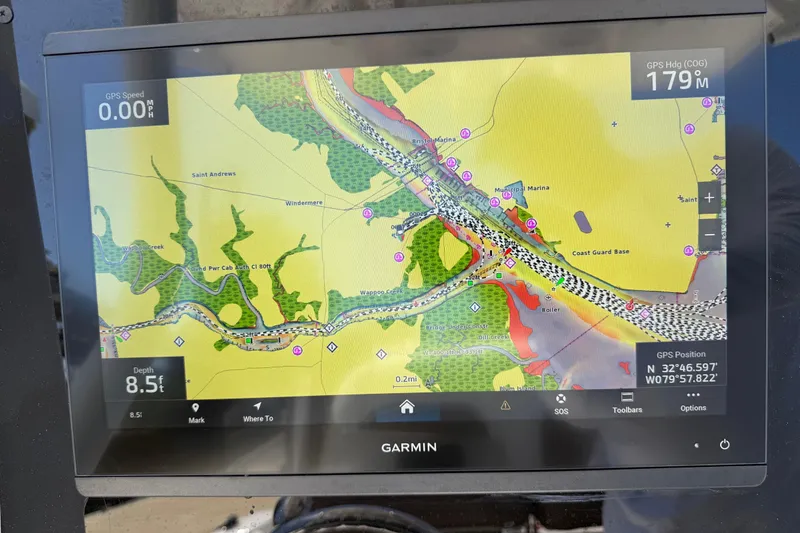 Slide: The Image of Garmin GPS display on 2025 Tidewater 272 CC Adventure boat, showing navigation map. - 12