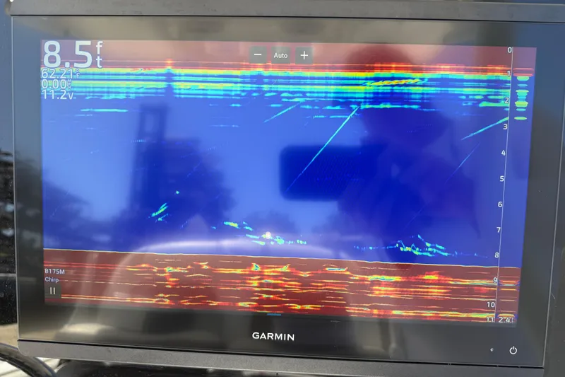 Slide: The Image of Garmin sonar display on 2025 Tidewater 272 CC Adventure boat. - 13