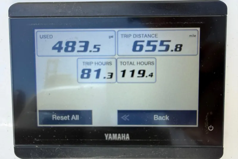 Slide: The Image of Display screen showing fuel usage, trip distance, and hours for 2025 Tidewater 272 CC Adventure. - 14