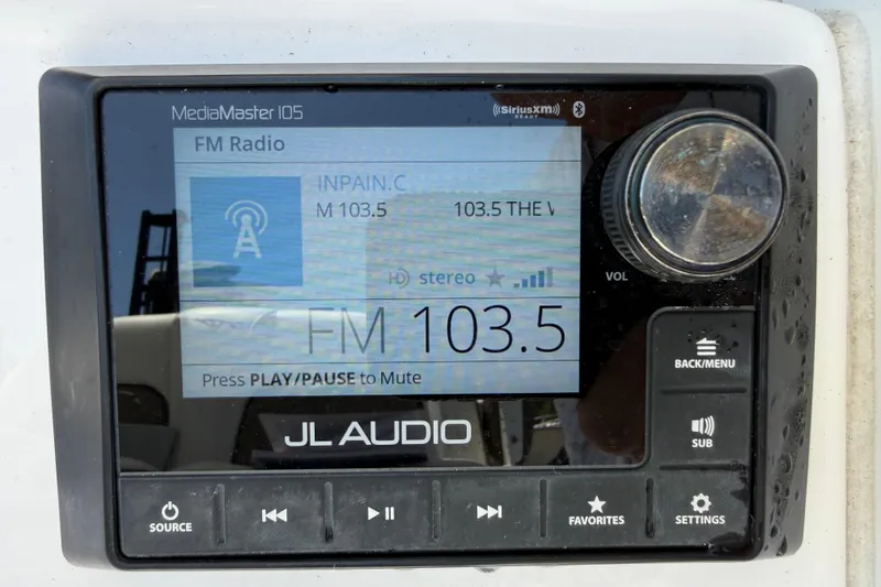 Slide: The Image of JL Audio MediaMaster 105 radio display on 2025 Tidewater 272 CC Adventure boat. - 15