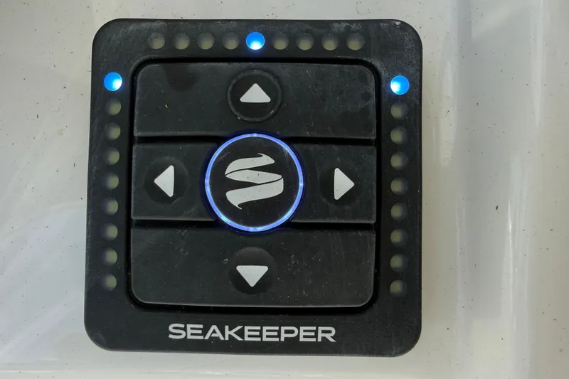 Slide: The Image of Seakeeper control panel on 2025 Tidewater 272 CC Adventure boat. - 17